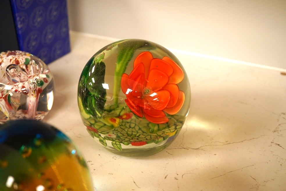 Seventeen various paperweights, including Lalique and a signed Murano example, some boxed, largest 10cm high